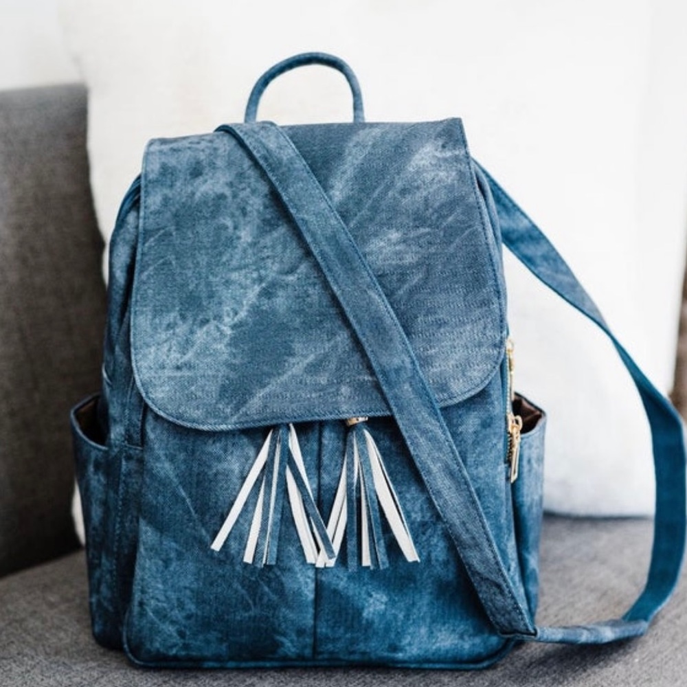 Blue Denim Wash Convertible backpack with matching wristlet